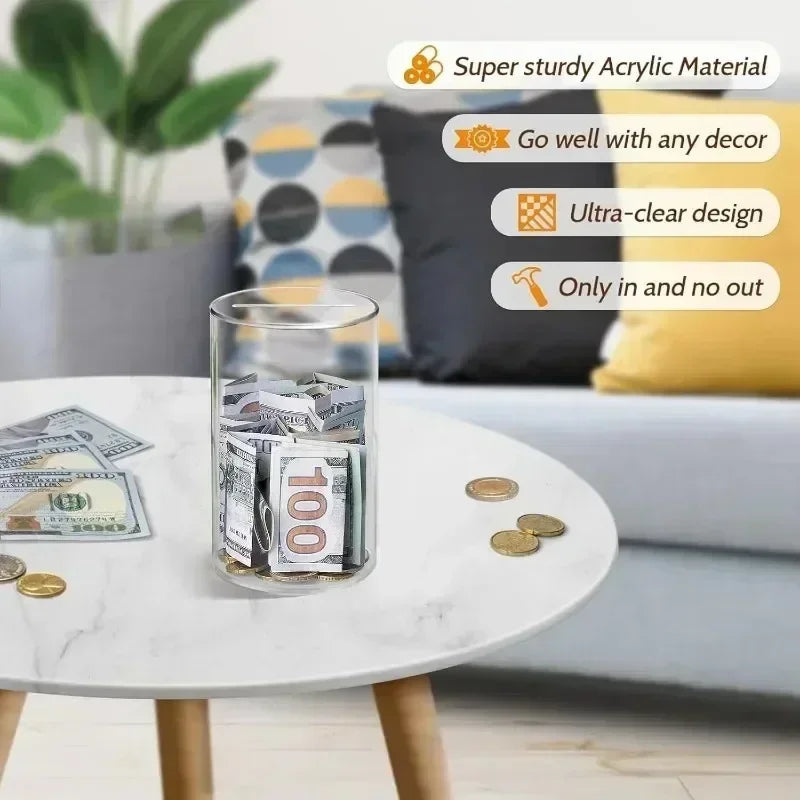 Clear acrylic piggy bank filled with coins and bills placed on a marble table.