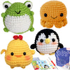 A set of crocheted animal toys including a green frog, an orange creature, and a yellow chick.