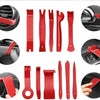 A collection of red auto trim removal tools and accessories displayed against a white background.