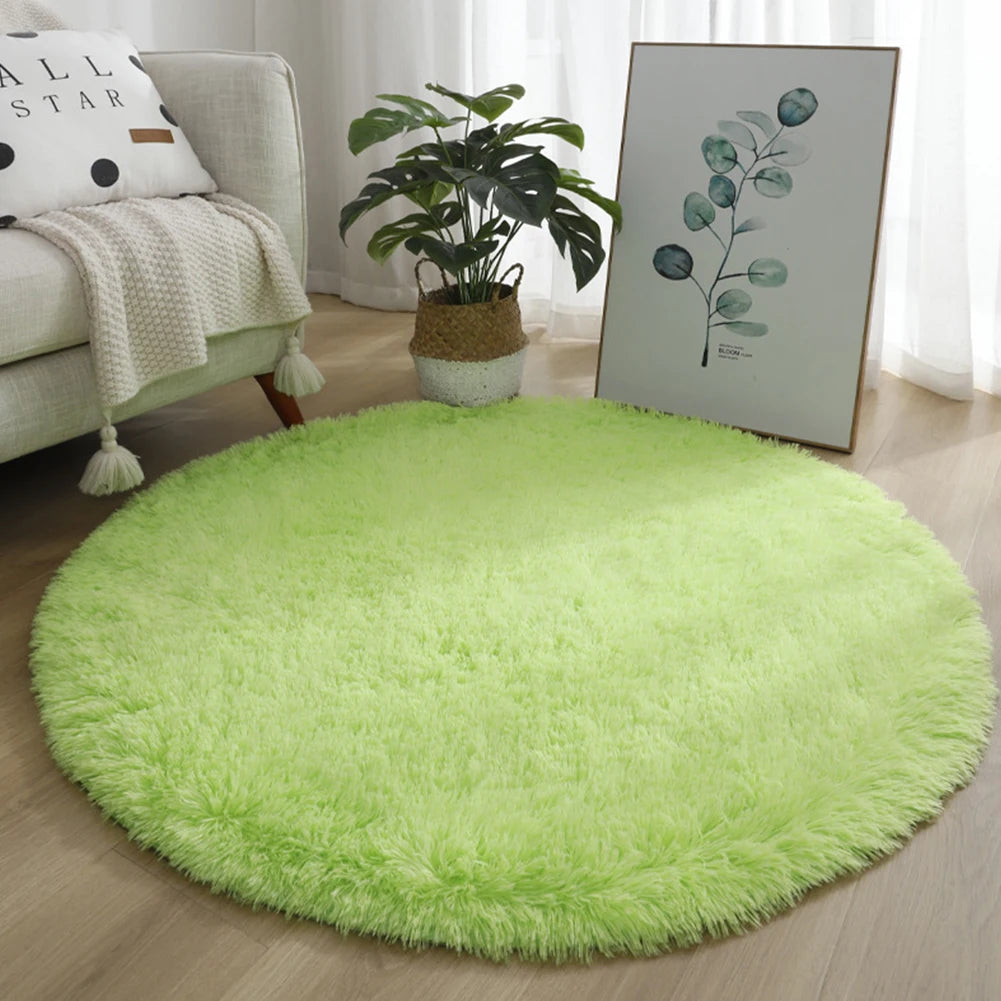 A bright lime green shaggy round rug placed on a wooden floor in a living room setting.