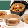 Disposable air fryer parchment paper liners in various sizes and a black air fryer basket