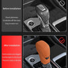 Comparison showing a gear shift cover before and after installation, highlighting its appearance and fit.