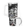 A stainless steel tumbler with a straw lid featuring a portrait of a man.