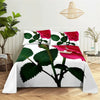 A bedding set featuring a large digital print of vibrant pink and red roses on a white background.