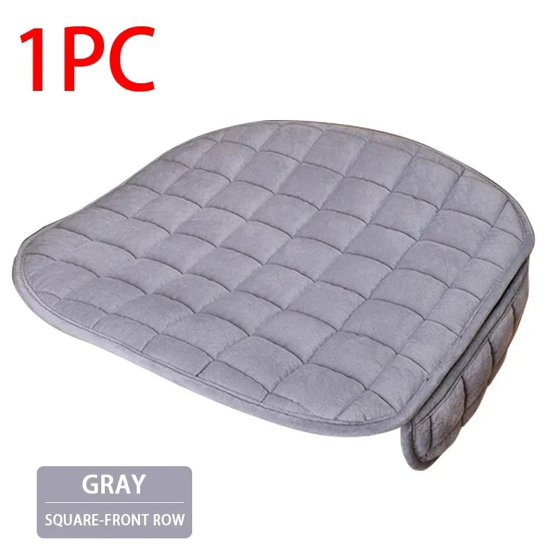 Gray quilted car seat cover with a square-front row design.