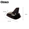 A sleek, black shark fin roof antenna for VW and Audi models.