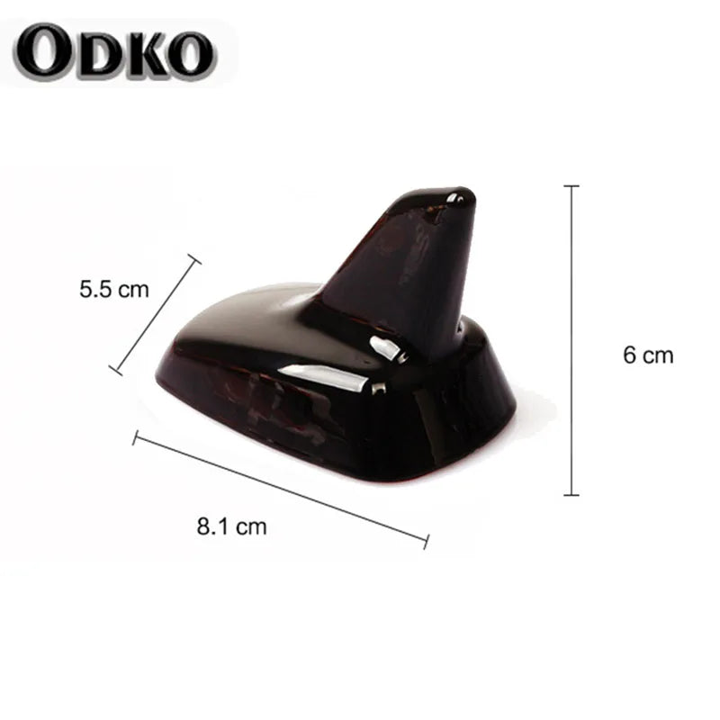 A sleek, black shark fin roof antenna for VW and Audi models.
