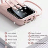 A pink portable power bank with multiple output ports and a display showing battery level.