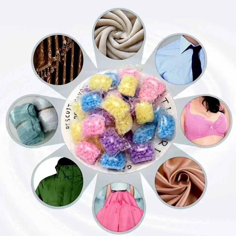 A collection of colorful water-soluble laundry fragrance beads in various shades and textures.