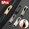 A set of five metal zipper sliders and a black zipper tape are shown for repair or replacement.