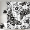 Black and white gothic skull shower curtain featuring moth and floral designs