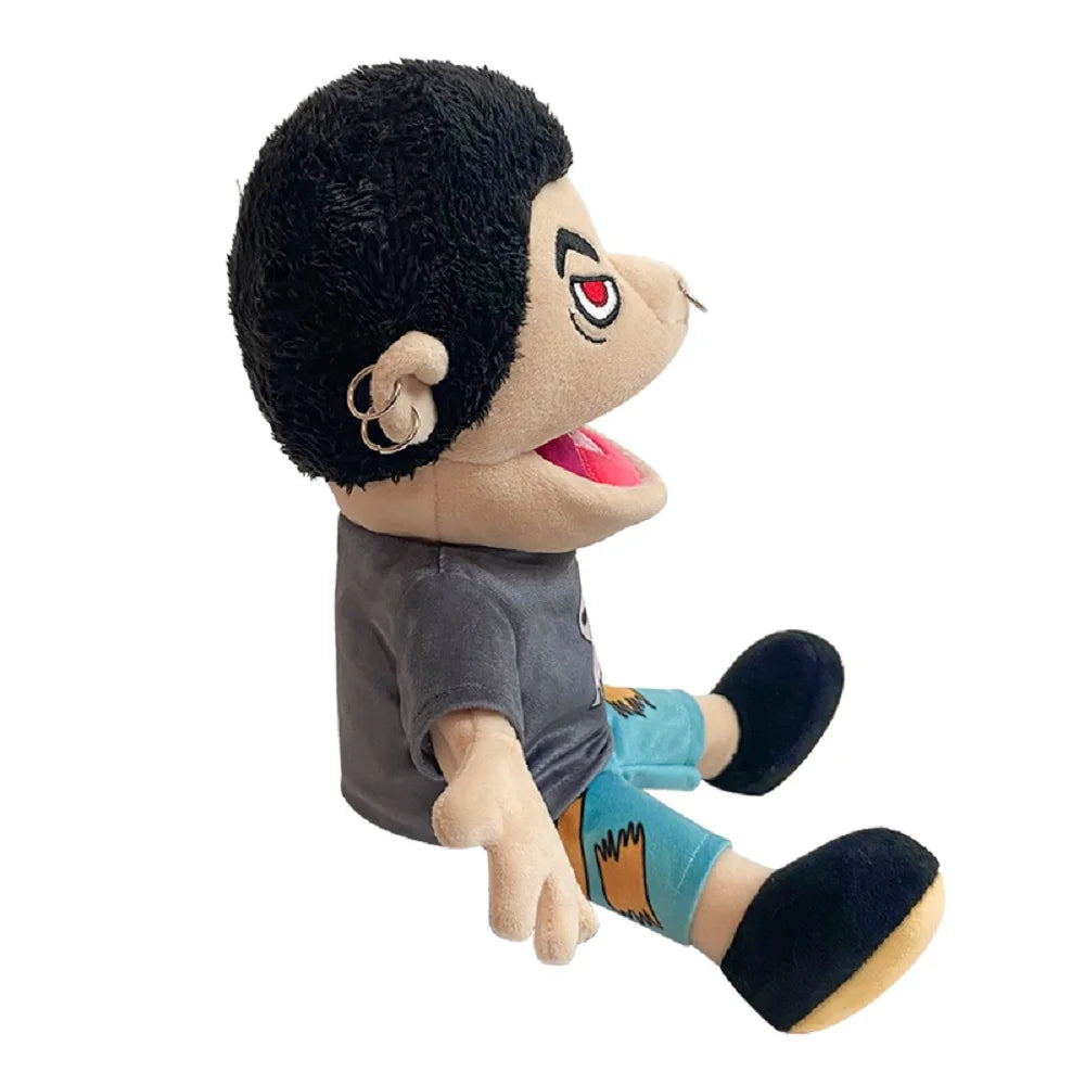 A plush toy of the character Jeffy from Sesame Street, wearing a gray shirt and blue shorts.