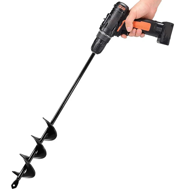 A hand is operating a black garden auger with a spiral drill bit for planting and digging.