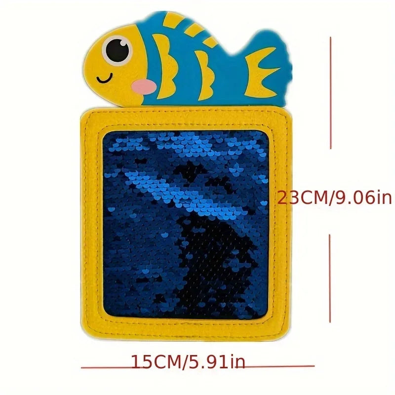 A yellow felt board featuring a blue fish cutout and a dark blue textured felt mat.