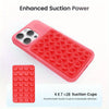 A pink silicone suction cup phone mount with multiple red suction cups shown alongside a separate red suction cup pad.
