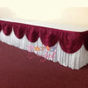 Elegant ice silk table skirt in white and deep red with matching top swag