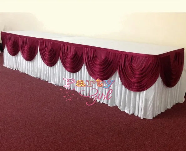 Elegant ice silk table skirt in white and deep red with matching top swag