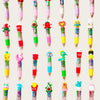 A collection of colorful kawaii ballpoint pens in various designs and colors suitable for party favors or classroom prizes.