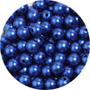 A close-up view of small, round, blue imitation pearl beads for jewelry making.