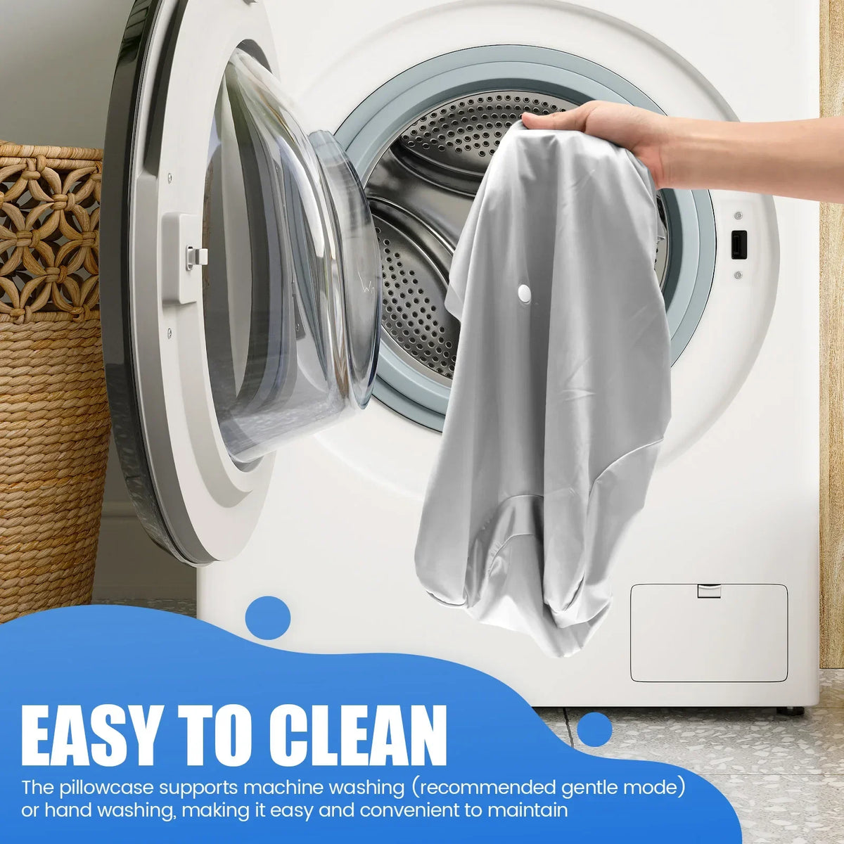 A hand is placing a gray zippered pillowcase into the drum of a white washing machine for cleaning.