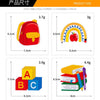 A collection of iron-on patches including a red backpack, a rainbow, and letter patches A, B, and C.