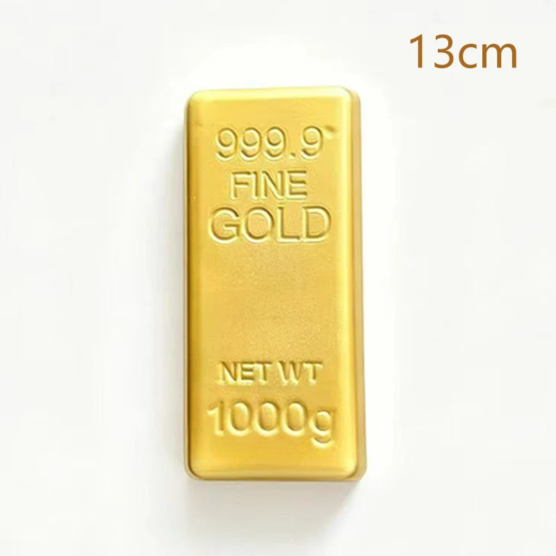 A rectangular bar of 999.9 fine gold metal weighing 1000g for stress relief.