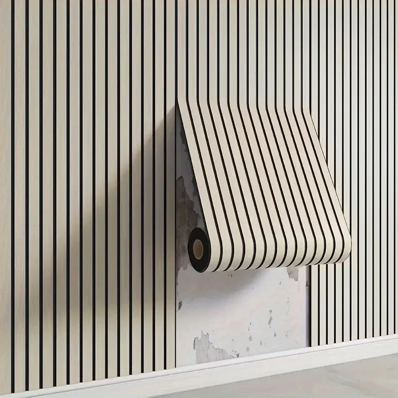 A close-up of a beige vertical striped wallpaper with a rectangular, vertically striped roll mounted on the wall.