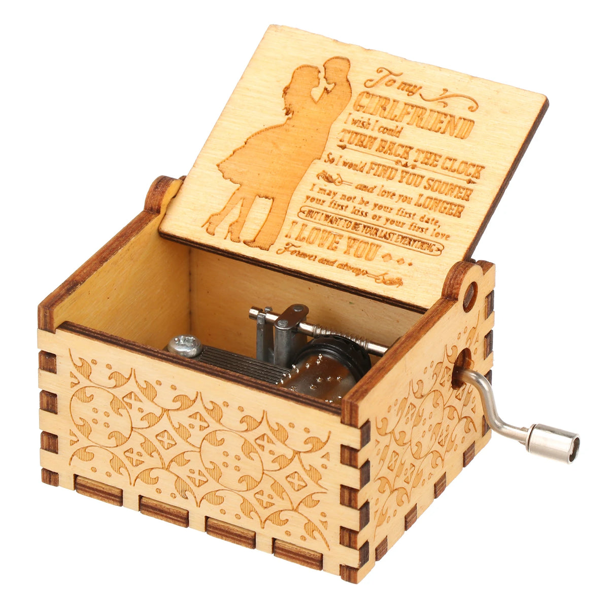 A vintage hand-cranked wooden music box with a lid open, featuring engraved text and a small metal crank.
