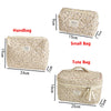 A set of beige vintage floral quilted cosmetic bags shown with various dimensions.