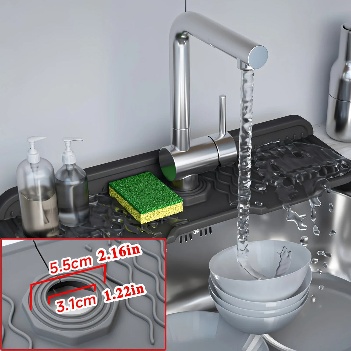 A close-up view of a silicone faucet splash guard with a foldable edge dripping water into a sink.