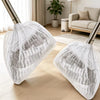 Two white disposable electrostatic broom covers are shown on a wooden floor.