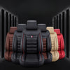 A set of black and tan PU leather car seat covers displayed against a dark background.