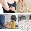 A hand applies a round adhesive bandage to an arm, next to a pack of waterproof bandages.