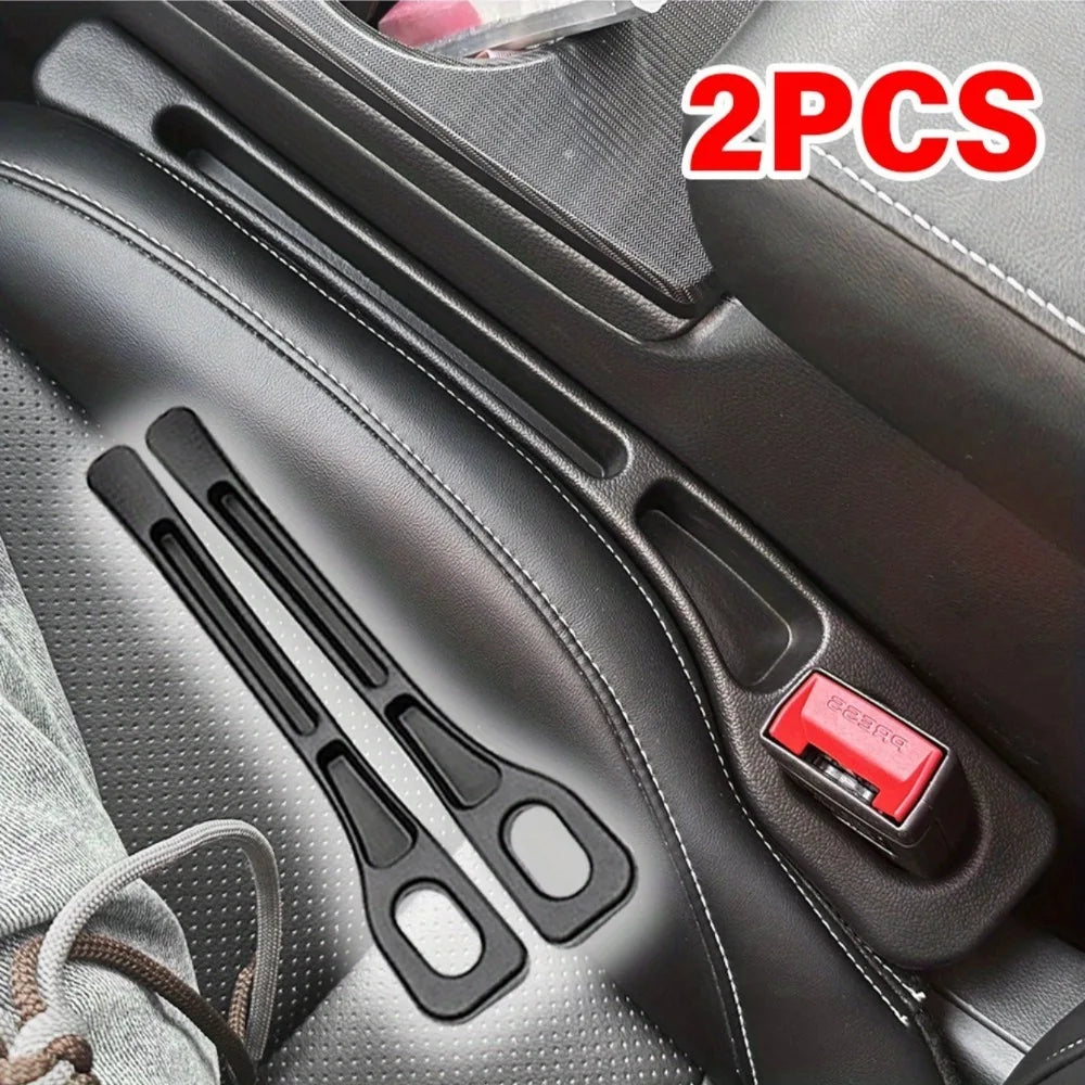 Two black silicone gap filler organizers for car seat consoles, designed for waterproof crevice storage.