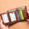 A brown slim PU leather card holder wallet for men displaying various cards and identification documents.