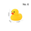 A bright yellow duck squeaky bath toy for babies, shown with dimensions 6.5cm high and 7.5cm long.