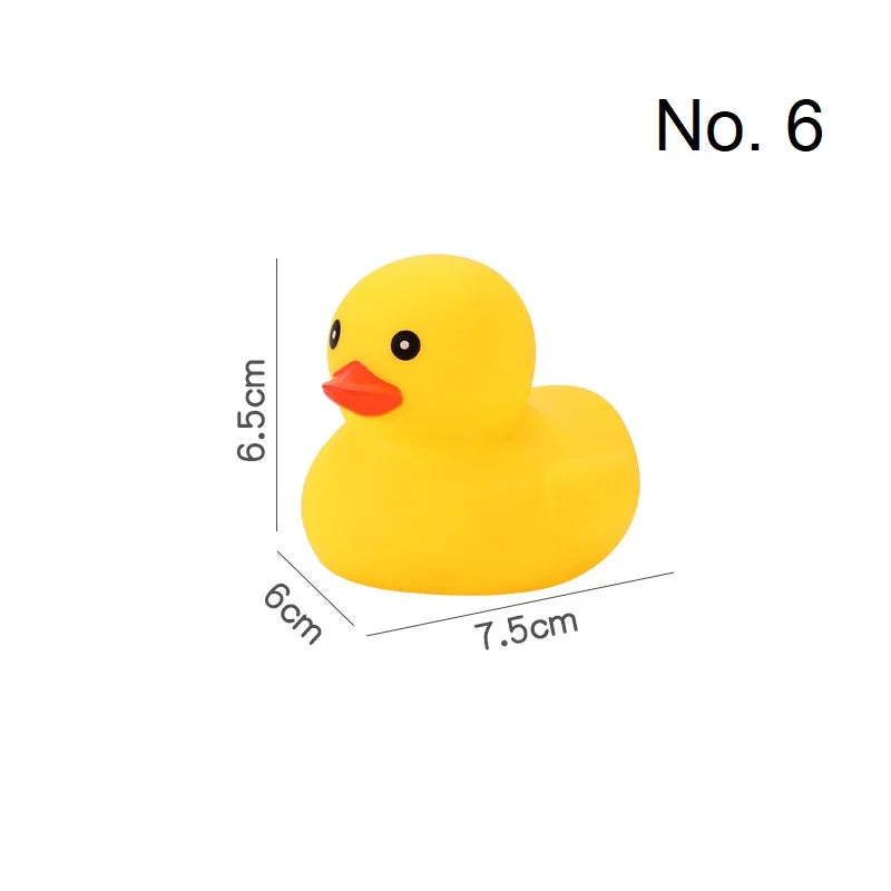 A bright yellow duck squeaky bath toy for babies, shown with dimensions 6.5cm high and 7.5cm long.