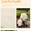 A close-up of a cream colored breathable cotton muslin fabric used as a car seat or stroller cover.
