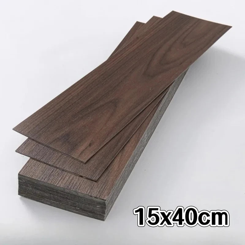Stack of dark brown wood grain floor tiles measuring 15x40cm