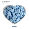 A pile of light blue silicone star heart beads for DIY jewelry making