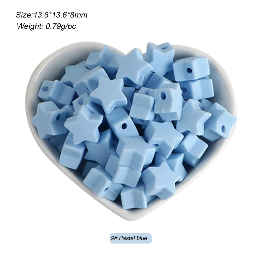 A pile of light blue silicone star heart beads for DIY jewelry making