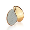 A gold-toned hair remover with a teardrop shape and a clear glass insert for sensitive skin.