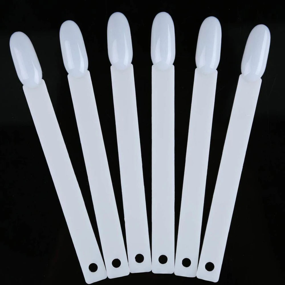 A set of clear acrylic false nail tips for practice and display