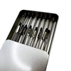 A close-up view of a magnetic helping hands tool with multiple flexible gooseneck arms and alligator clips inside a metal hol
