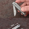 Compact Stainless Steel Folding Knife with Keychain