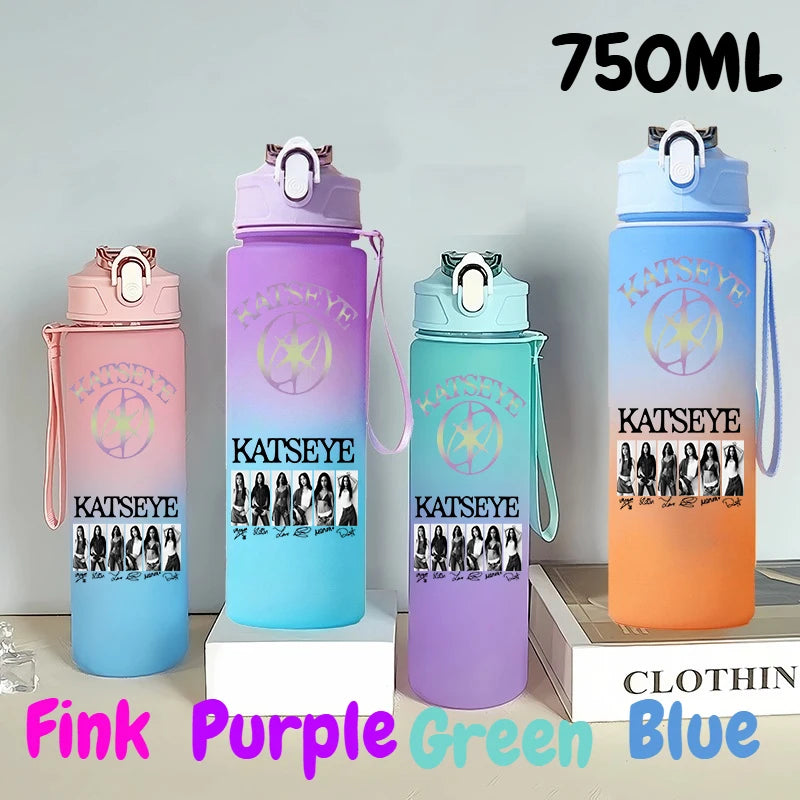 A set of three 750ml portable sports water bottles in pink, purple, green, and blue colors.