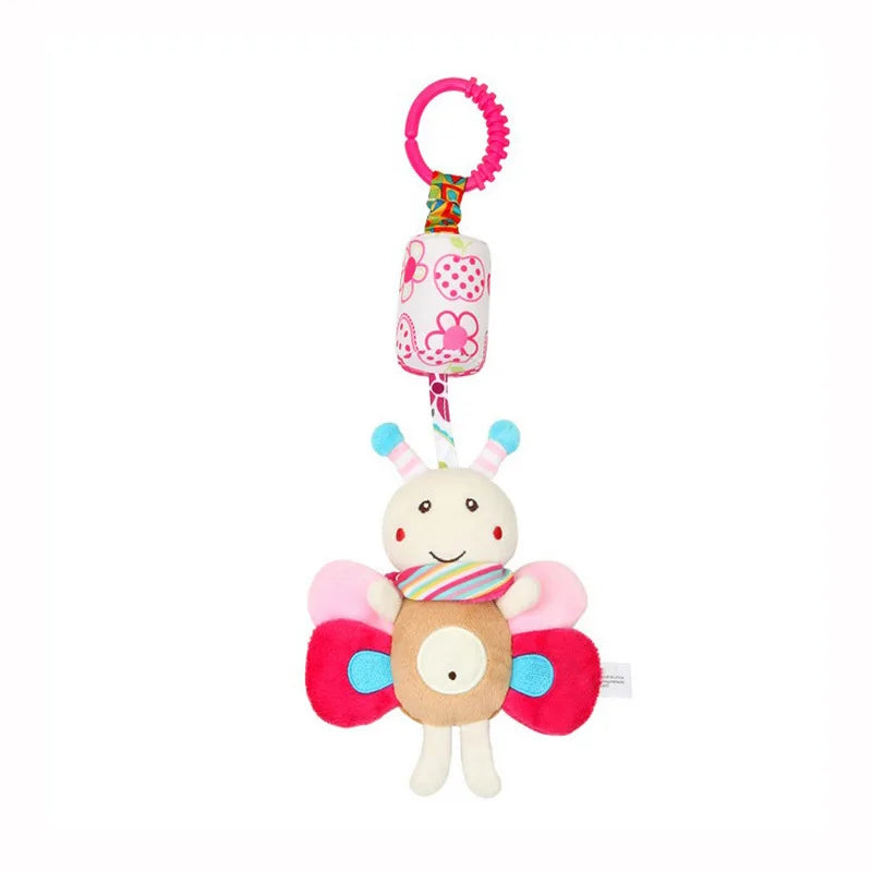 A soft plush baby rattle toy with a hanging bell shaped like a cartoon animal for newborns.