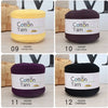 Twelve skeins of cotton yarn in various colors including yellow, coffee, violet, and black.