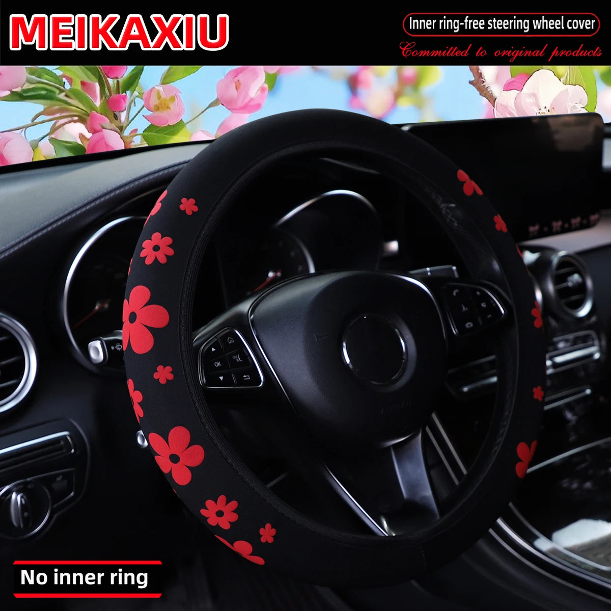 Black floral steering wheel cover with red flowers installed in a car interior.