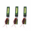Three sticks of realistic cockroach prank gum with green packaging and red legs